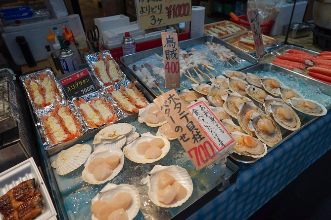 Kuromon Market Food Walking Tour in Osaka - Exploring Kuromon Markets History