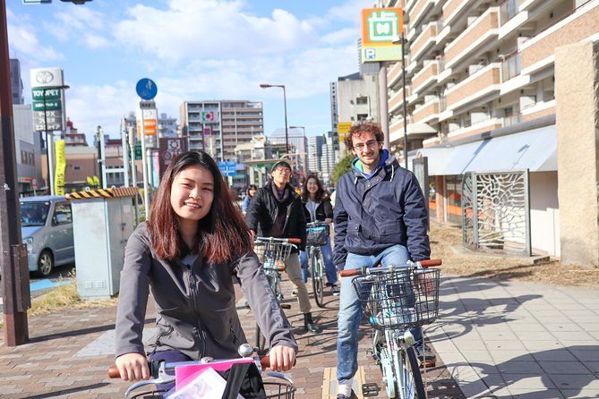 4-Hour Osaka Bike Tour to the Neighborhood of Osaka Castle - Visiting Temples and Gardens