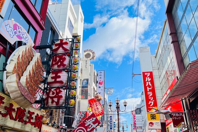 Full Day Walking Tour in Osaka Castle Temples and Ukiyoe - Highlights of Osaka Castle